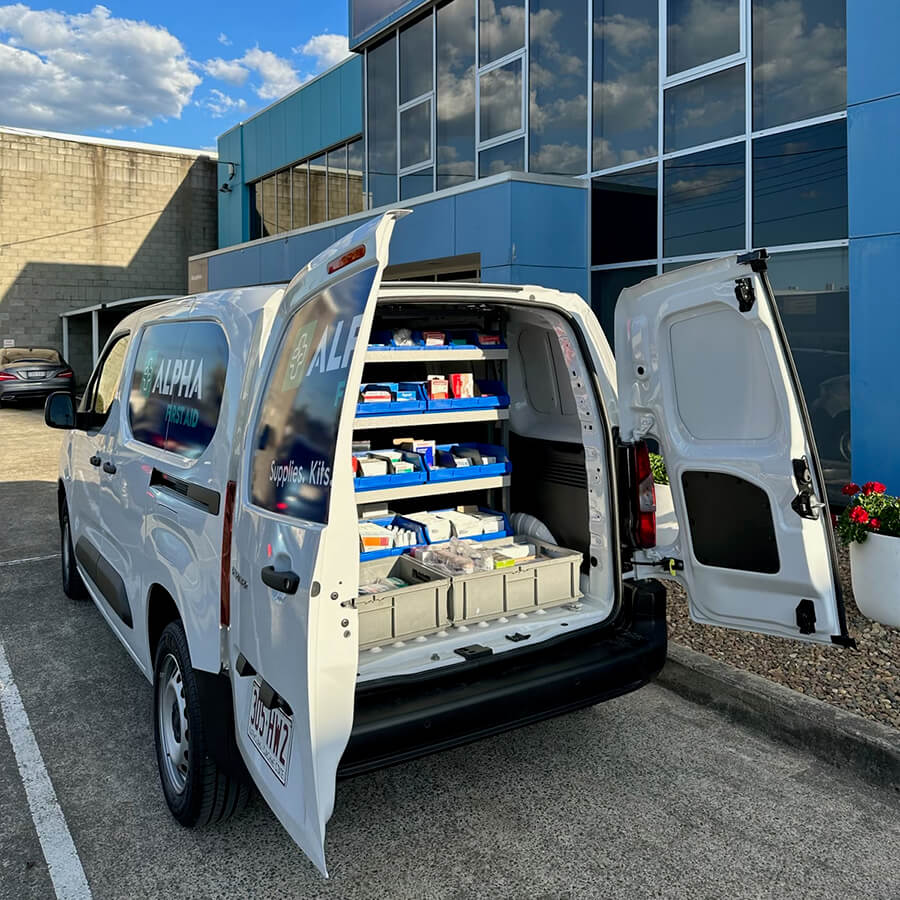 Back of van open with first aid contents